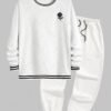 trendy Men's Colorblock Round Collar Rose Embroidered Textured Pullover Long Sleeves Sweatshirt with Matching Slant Pocket Drawstring Beam Feet Casual Jogger Pants Set - WHITE ONE SIZE